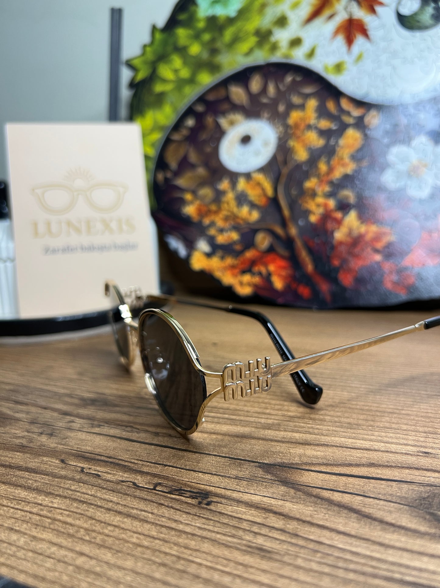 MİUMİU Güneş Gözlüğü ( MM22454 gold-siyah)