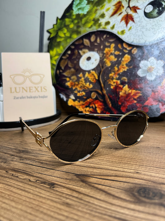 MİUMİU Güneş Gözlüğü ( MM22454 gold-siyah)